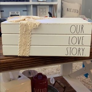 Wooden book pile. Rae Dunn